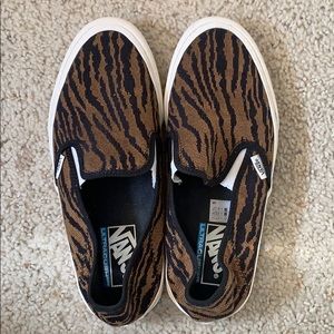 Vans tiger print shoes.